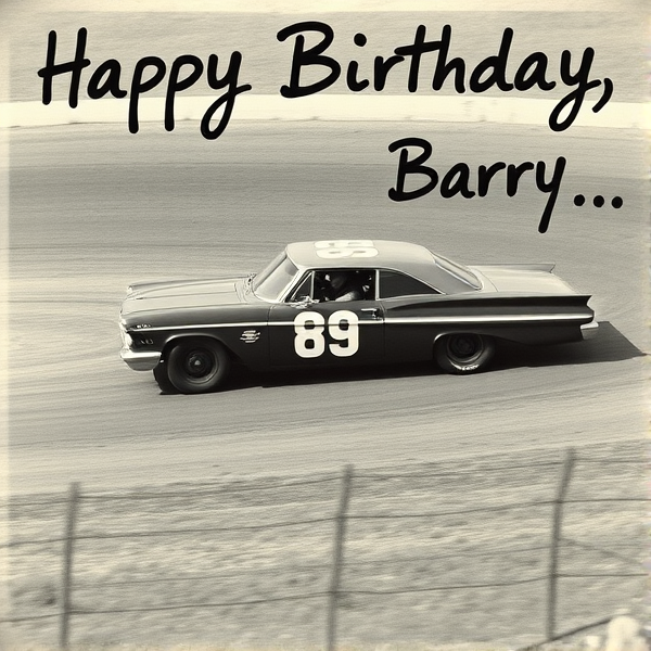 a vintage monochrome photo of a vintage stock car racing around a high banked dirt oval with Happy Birthday Barry handwritten on the photo in black marker. The car should have 89 written on the door.